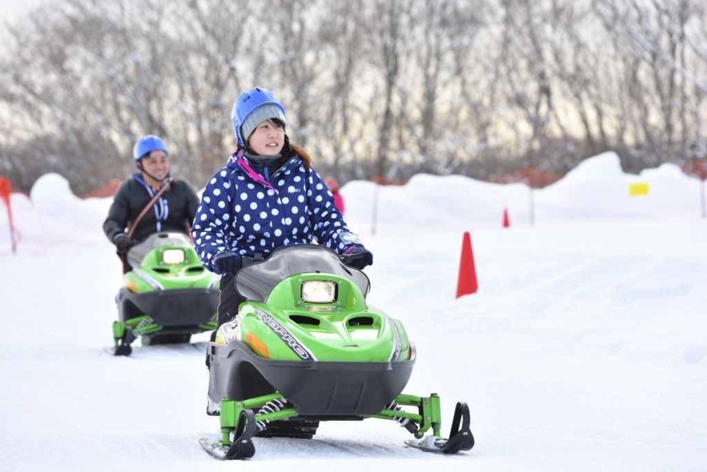 Snow Mobiling In Hokkaido